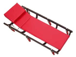 Carrello sottomacchina - poggiatesta regolabile, dimensioni mm.420x1205 , completo di 6 ruote in plastica ø mm.60 con perno, girevoli, peso kg. 6,00