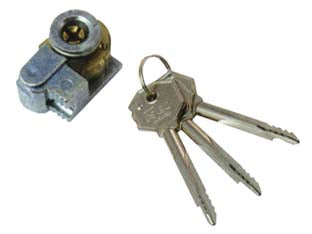 Cilindro a croce 3 chiavi 990 - (990875) - montato su supporto in zama, 3 chiavi mm.78, due boccole guidachiave in nylon, utilizzabile con serrature da montare per allu...